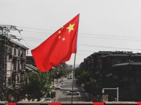 red and white flag on pole